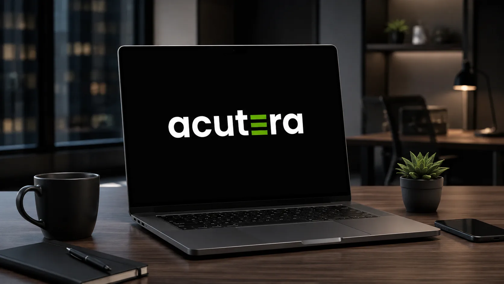 Acuteera branded laptop in a modern office workspace